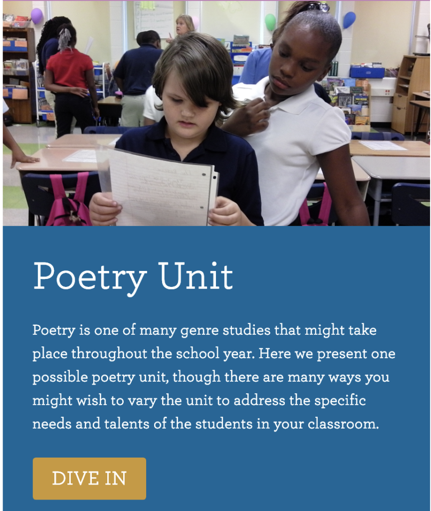 Two students working together to write a poem in a classroom
